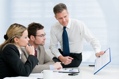manager sharing information with coworkers