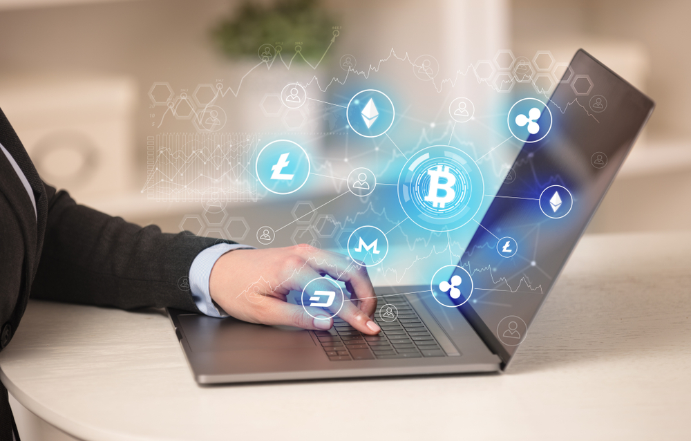 Business woman working on tablet with cryptocurrency bitcoin link network